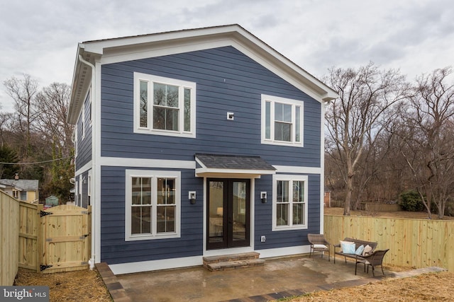 rear view of house featuring a patio area