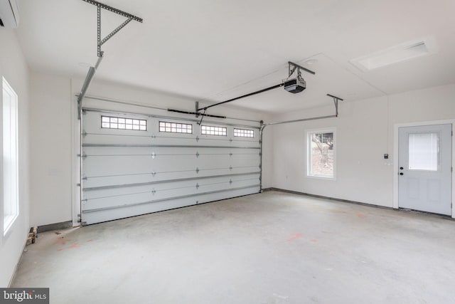 garage featuring a garage door opener