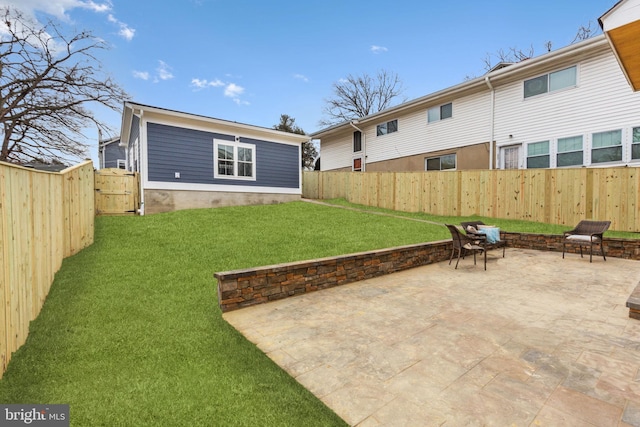 back of property featuring a lawn and a patio