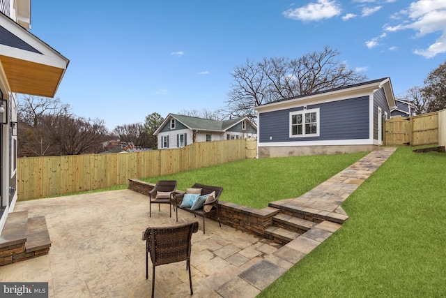 exterior space featuring a lawn and a patio