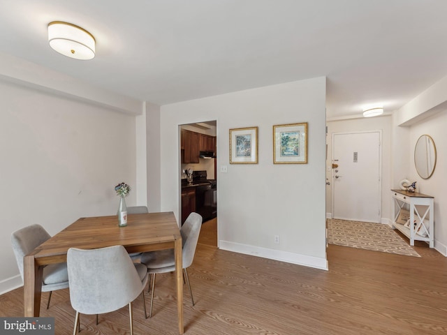 dining room featuring hardwood / wood-style flooring