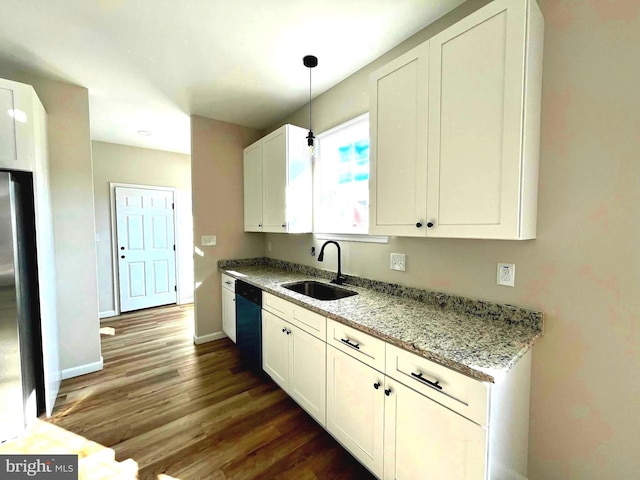 kitchen with white cabinets, sink, light stone countertops, black dishwasher, and dark hardwood / wood-style flooring