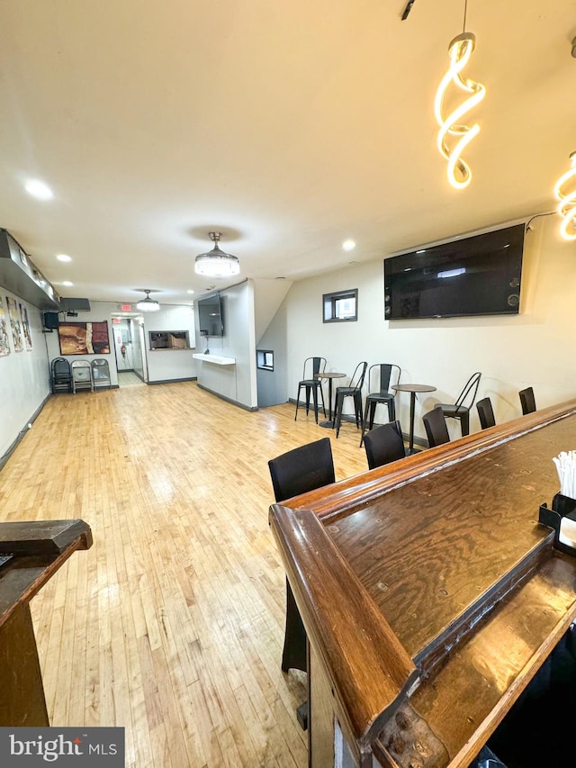 interior space with hardwood / wood-style flooring