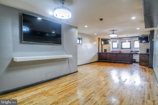 unfurnished living room with light hardwood / wood-style floors