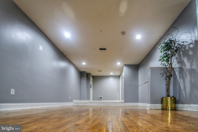 unfurnished room featuring hardwood / wood-style flooring