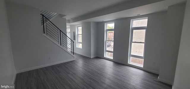 foyer with dark hardwood / wood-style floors