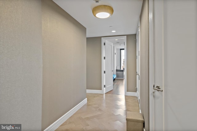 corridor featuring light parquet floors