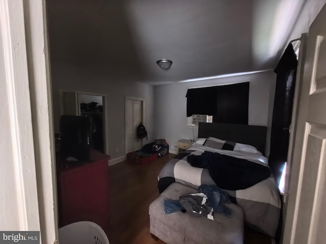 bedroom featuring hardwood / wood-style flooring