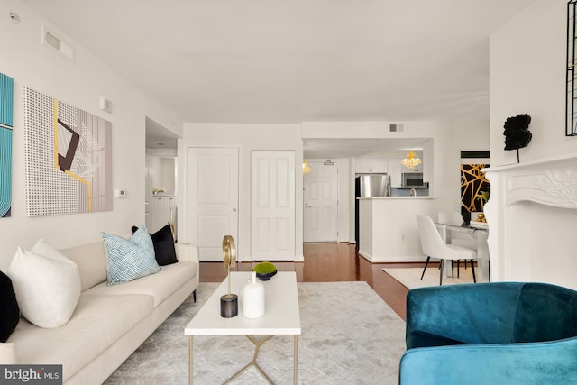 living room with hardwood / wood-style floors