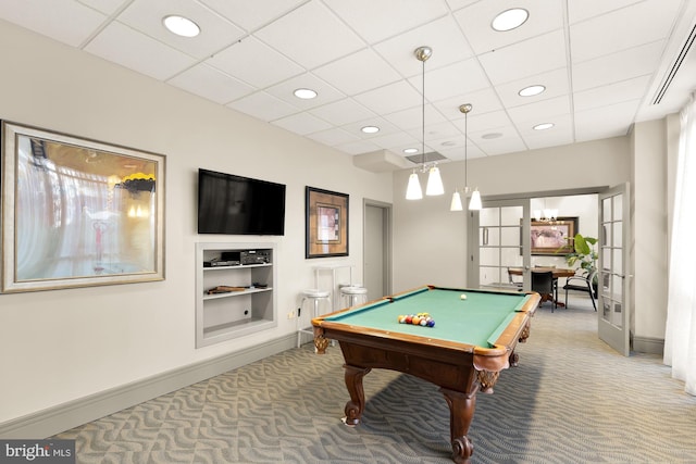 recreation room with carpet floors, built in features, and billiards