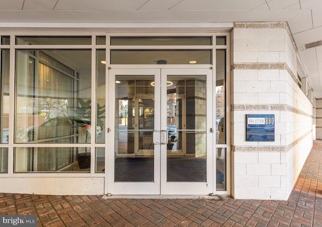 entrance to property featuring french doors