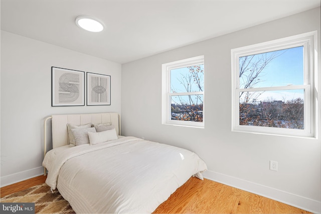 bedroom featuring hardwood / wood-style flooring