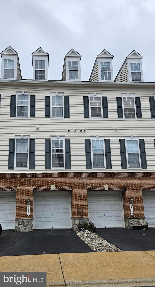 view of property featuring a garage