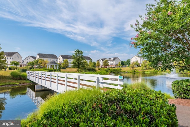 view of home's community featuring a water view