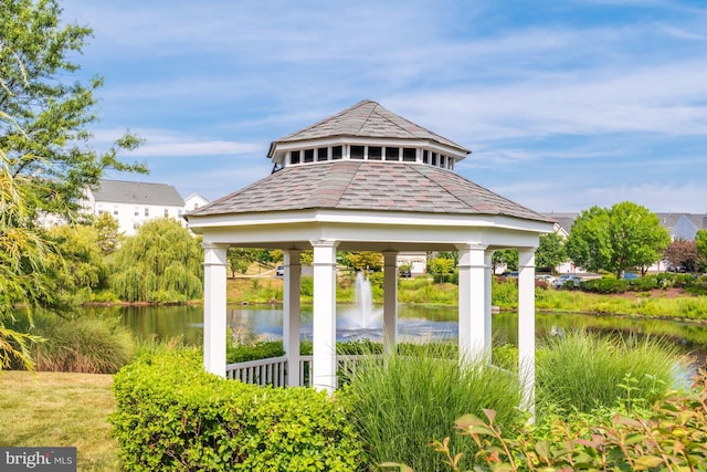 view of home's community featuring a gazebo and a water view