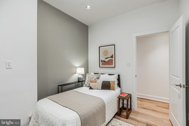 bedroom featuring light wood-type flooring