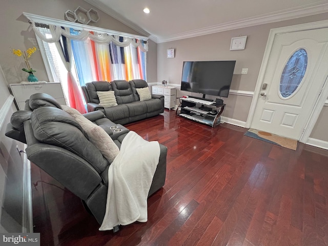 living room featuring crown molding, dark wood-type flooring, and vaulted ceiling