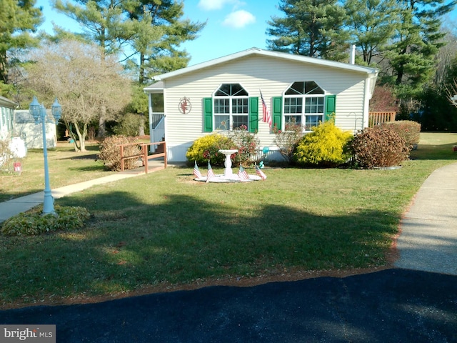 exterior space featuring a front yard