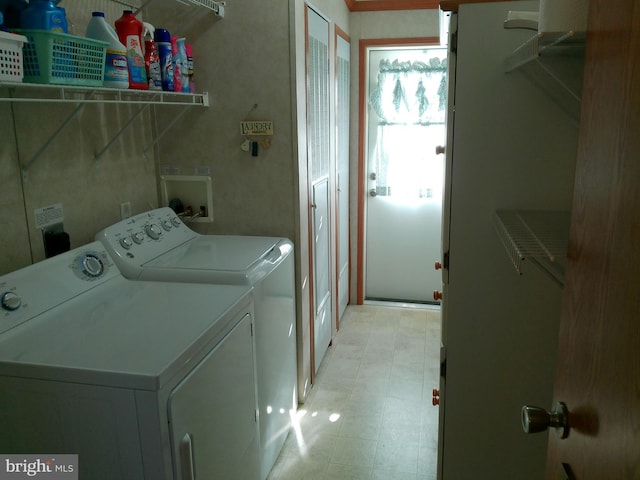 laundry area featuring washing machine and dryer