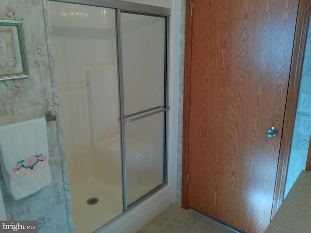 bathroom with an enclosed shower