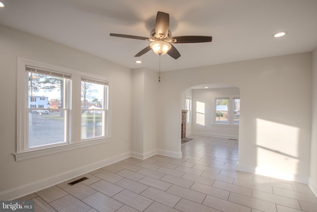 empty room featuring ceiling fan