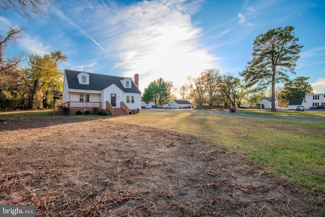 view of property exterior with a yard