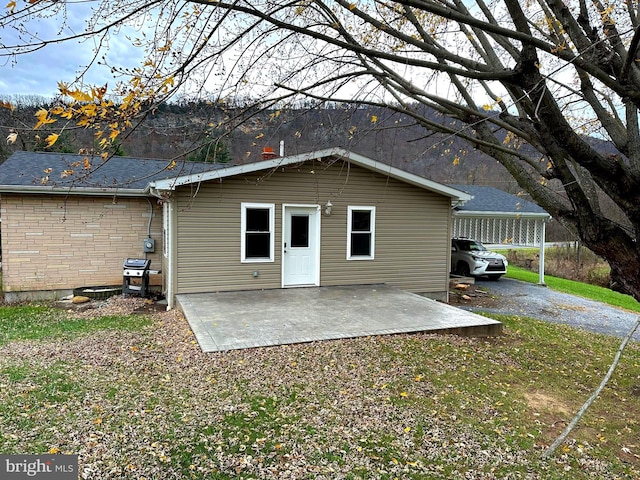 rear view of property with a patio