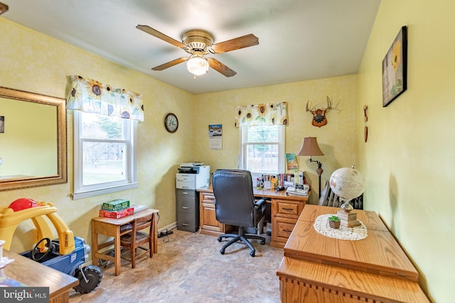 office space with ceiling fan