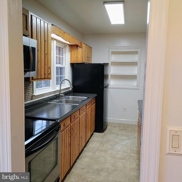 kitchen with sink and black appliances