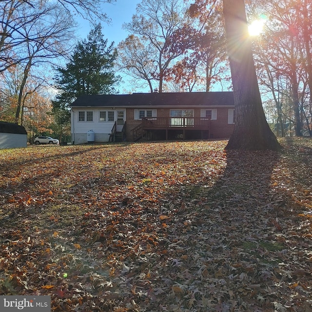 view of front of house featuring a deck