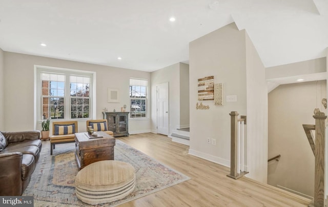 living room with light hardwood / wood-style floors