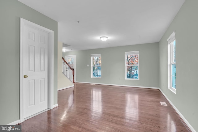 spare room featuring hardwood / wood-style flooring