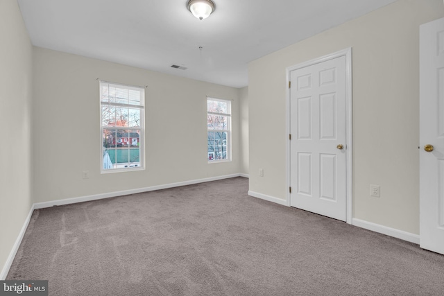 unfurnished bedroom featuring carpet flooring