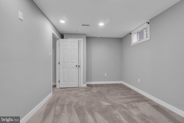 basement with light carpet