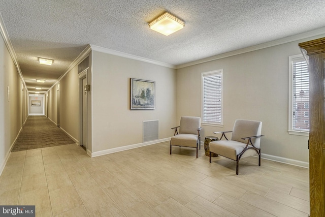 living area with crown molding