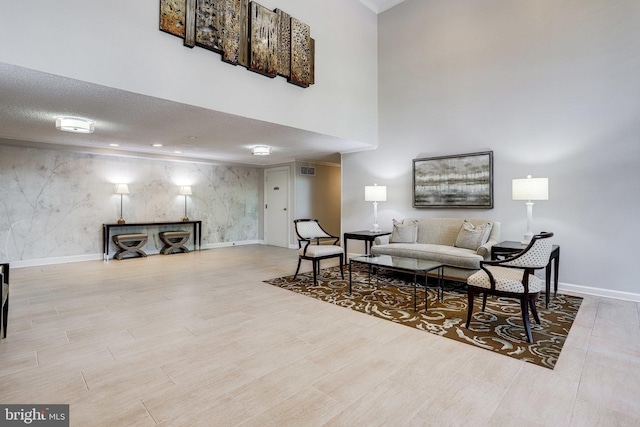 living room with a textured ceiling