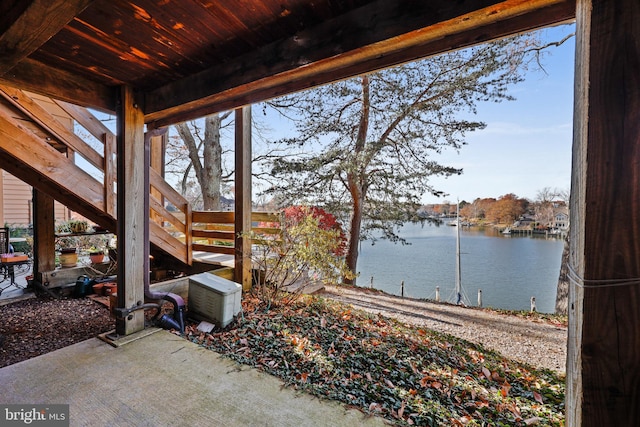 view of patio featuring a water view