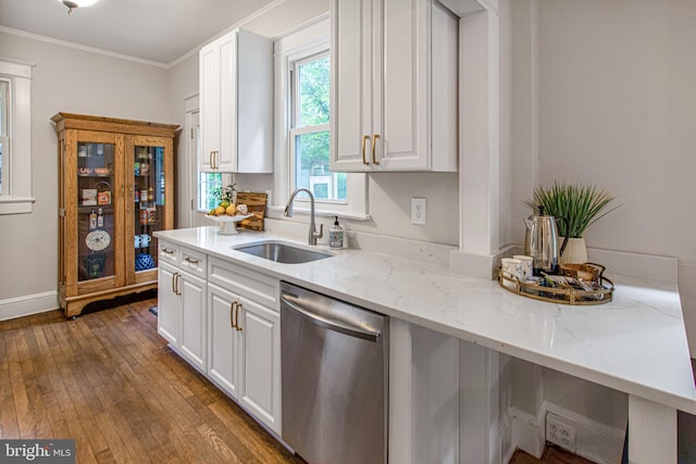 kitchen featuring light stone countertops, ornamental molding, dark wood-type flooring, sink, and dishwasher