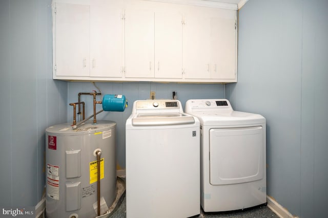 laundry area featuring separate washer and dryer, electric water heater, cabinets, and ornamental molding