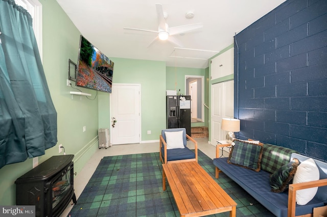 living room with ceiling fan