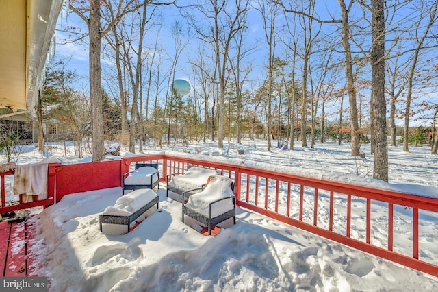 view of snow covered deck