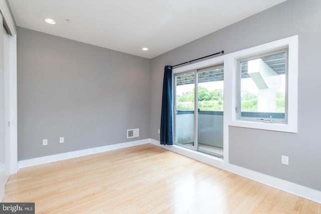 empty room featuring light hardwood / wood-style floors