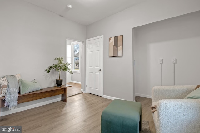 sitting room featuring hardwood / wood-style floors