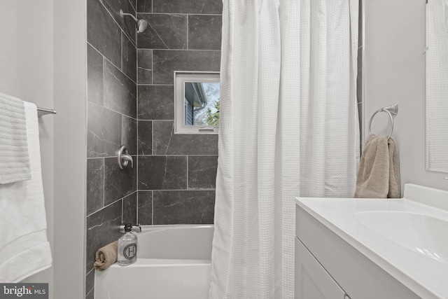 bathroom featuring vanity and shower / tub combo