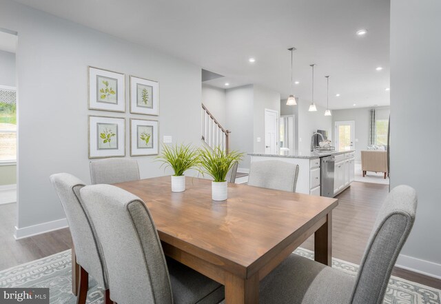 dining room featuring dark hardwood / wood-style flooring