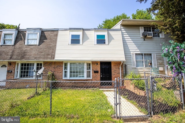 view of front of home with a front lawn