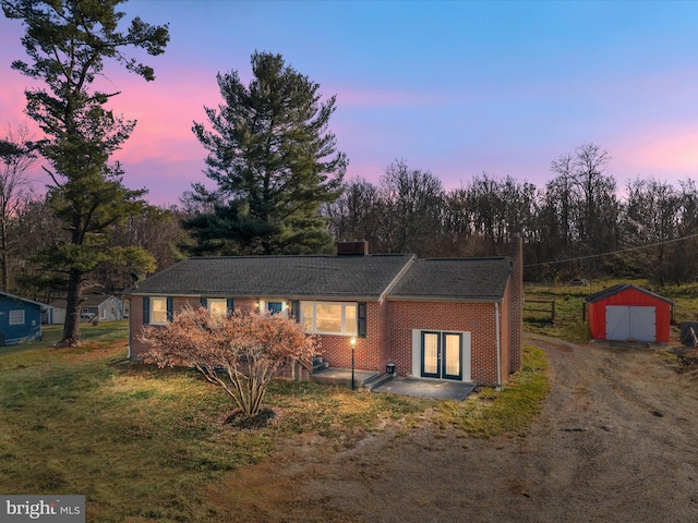 view of front of home with an outbuilding