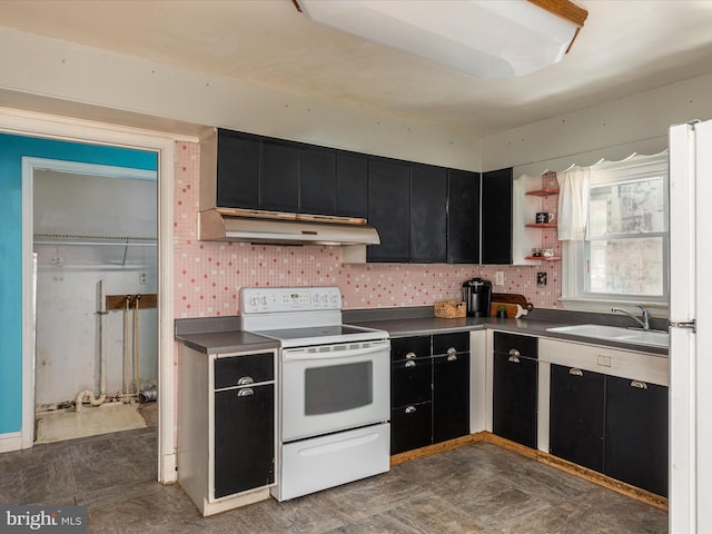 kitchen with white appliances, tasteful backsplash, and sink