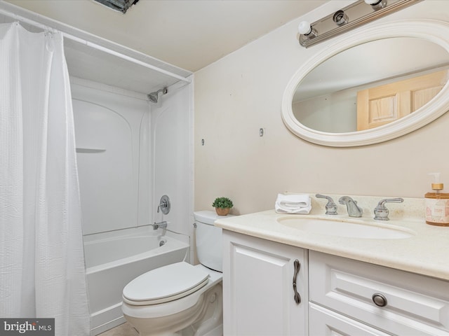 full bathroom featuring vanity, toilet, and shower / tub combo with curtain