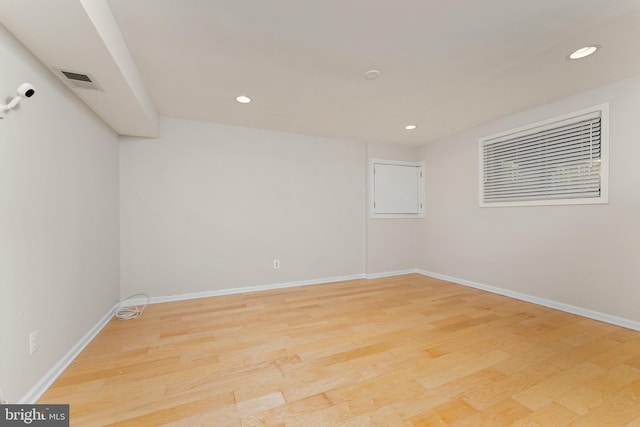 empty room with light wood-type flooring